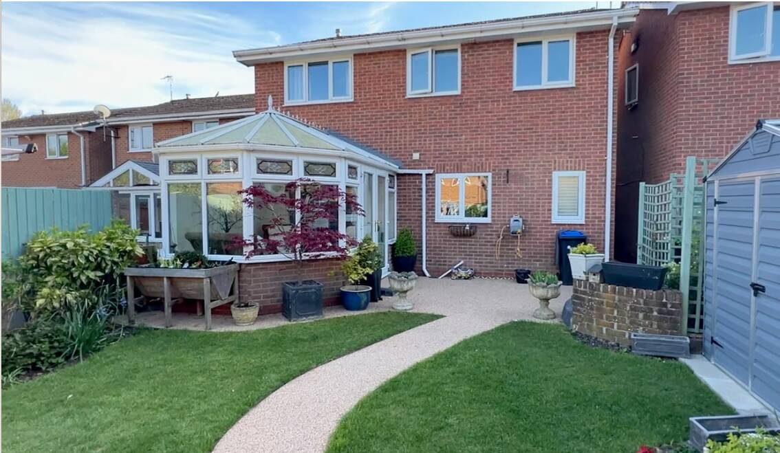 garden with patio area