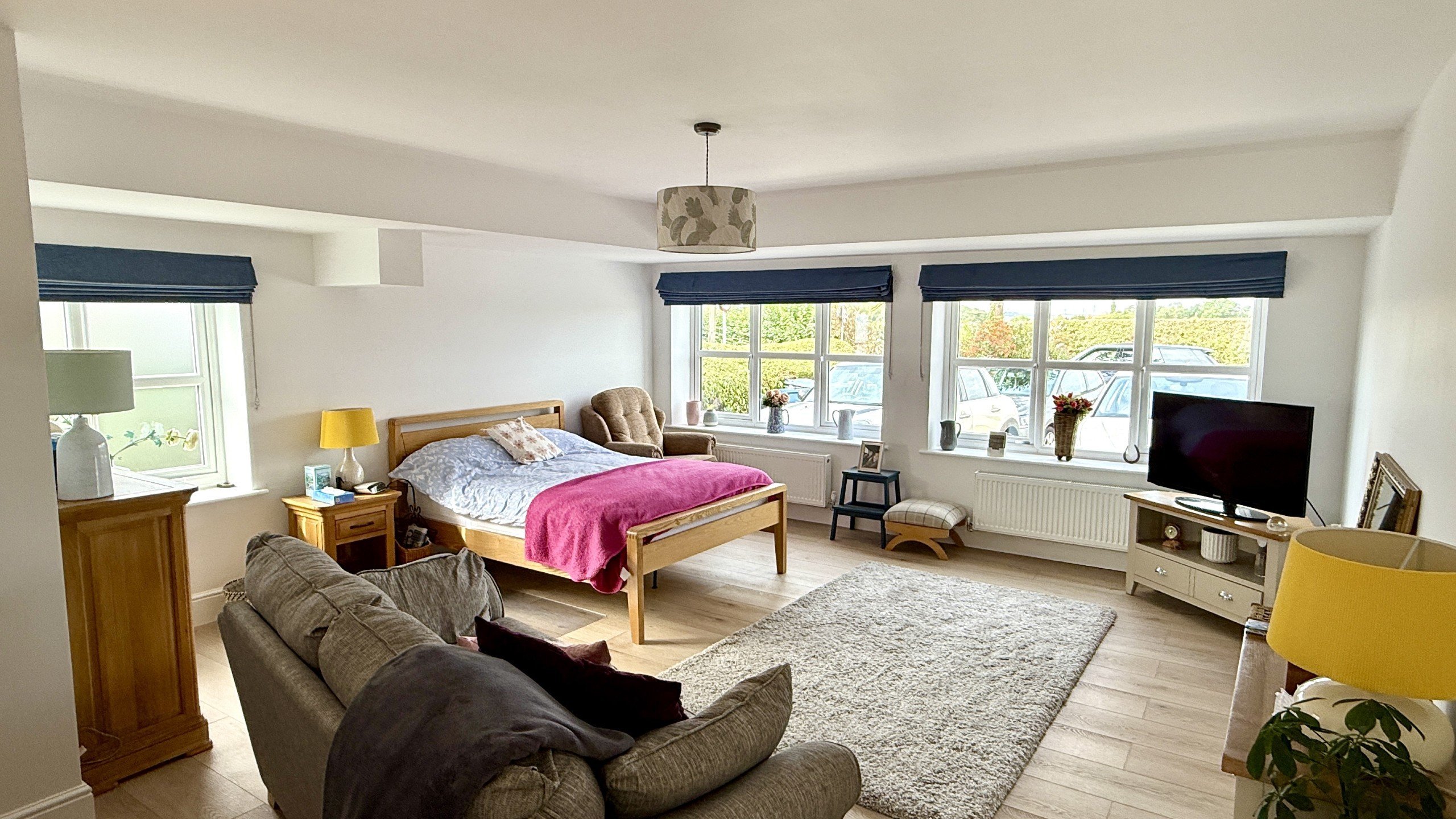 Cozy bedroom with modern furnishings.