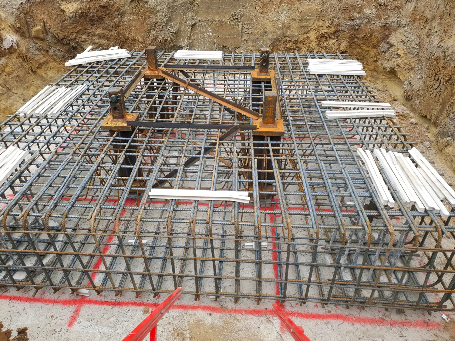 Construction site with steel reinforcement grid