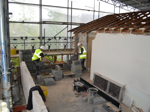 Elegant brick house with landscaped garden